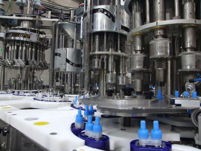 filling and capping machine for insect control bottle