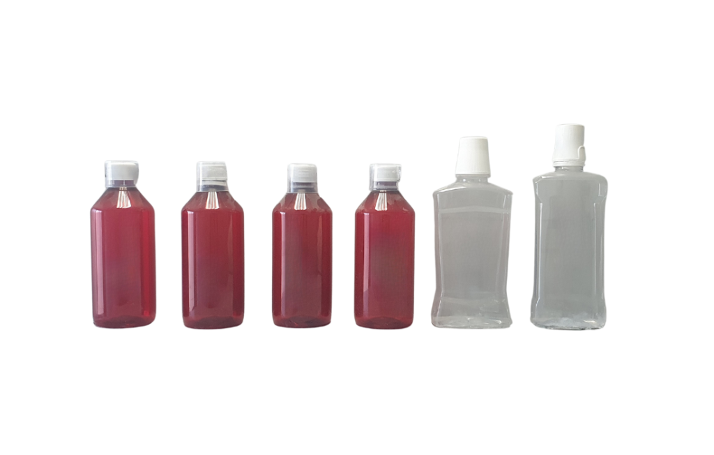 Mouthwash bottles filled using a monoblock filling line, neatly arranged after the automated filling process.
